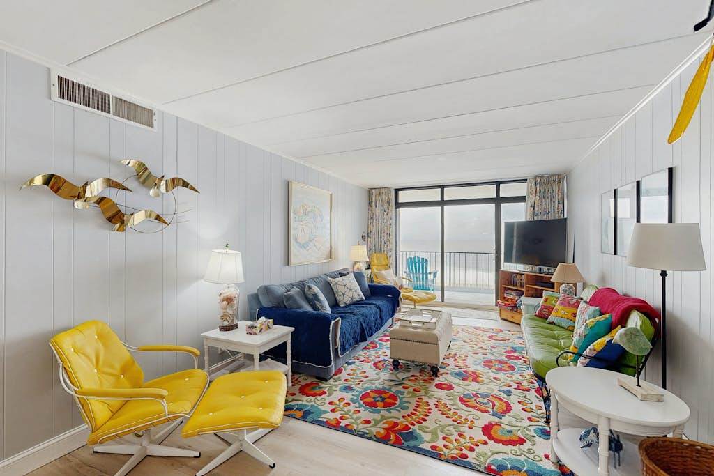 Renovated oceanfront home with sunrise views, large balcony, pool & beach access