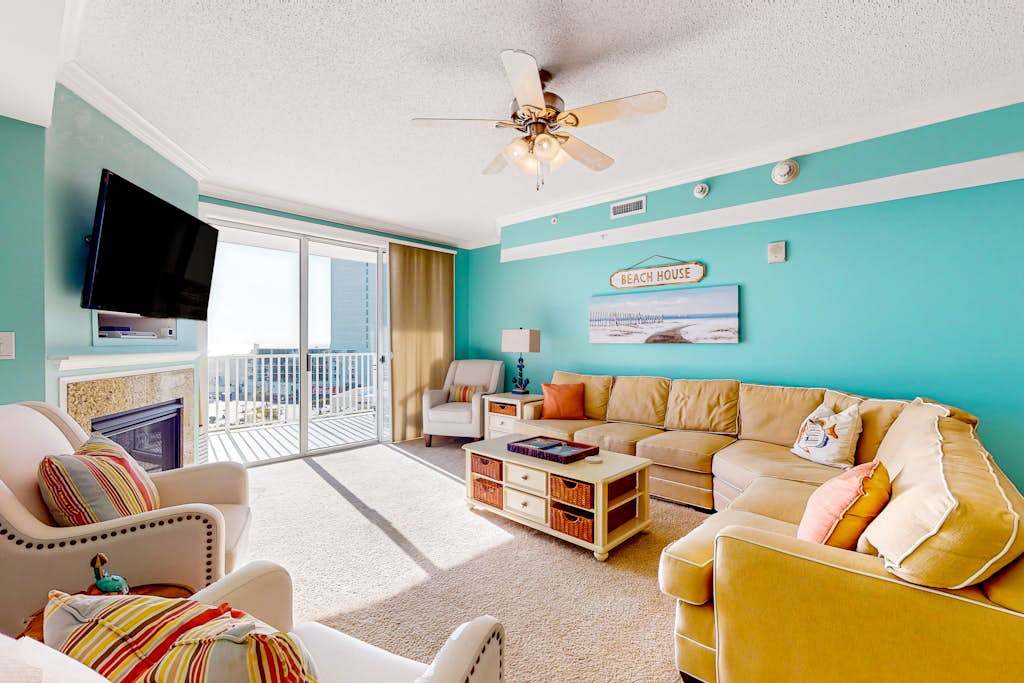 Coastal sanctuary with large deck, bay views, full kitchen, AC, & pool access