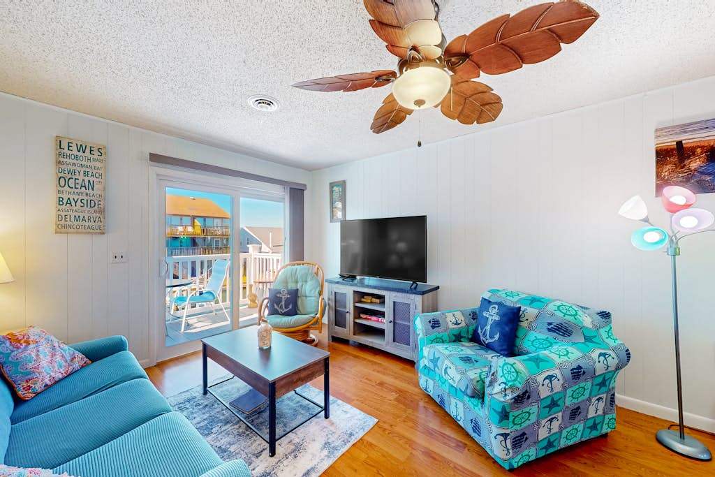 Water view condo with peaceful balcony, open layout, smart TVs, games, & washer & dryer