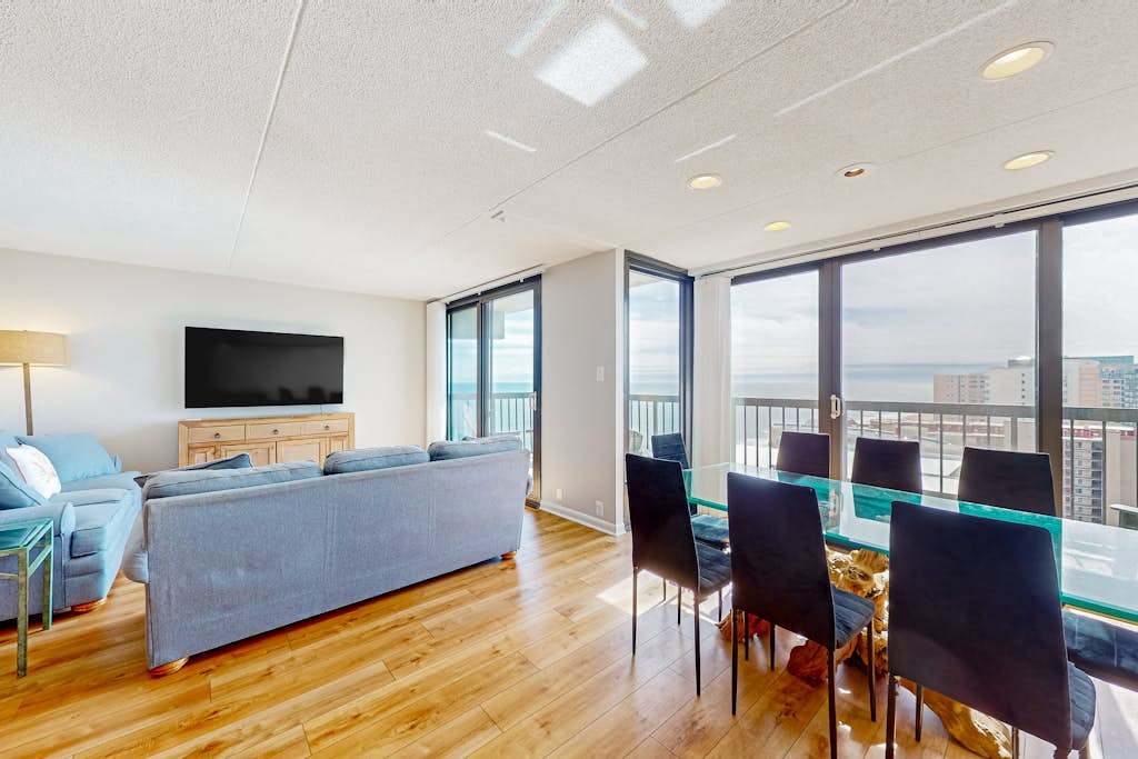 Wave view penthouse with resort-style amenities, two balconies, & elevators