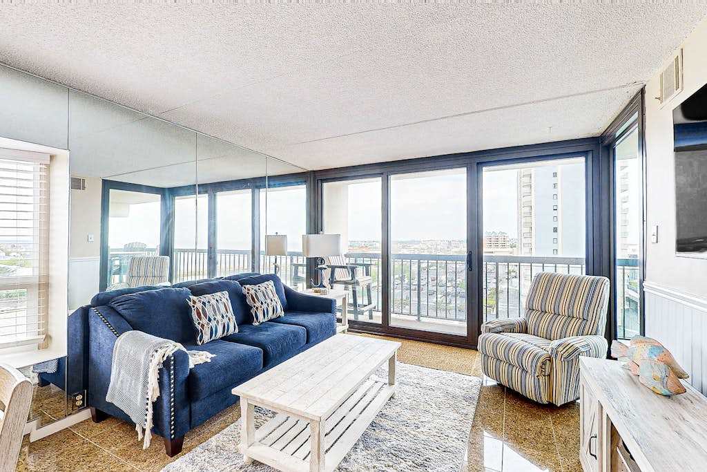 Luxury condo with bay and ocean views, pool, and beach access