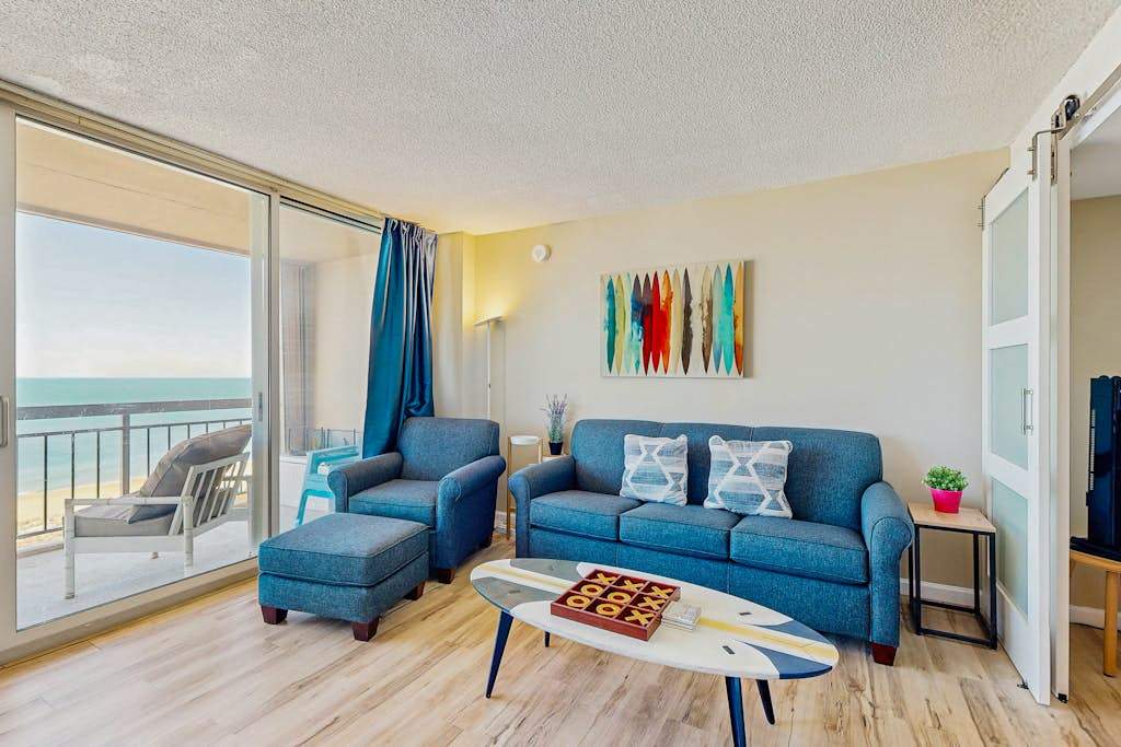 Beachfront condo with outdoor pool, water & sunset views, & shared tennis court