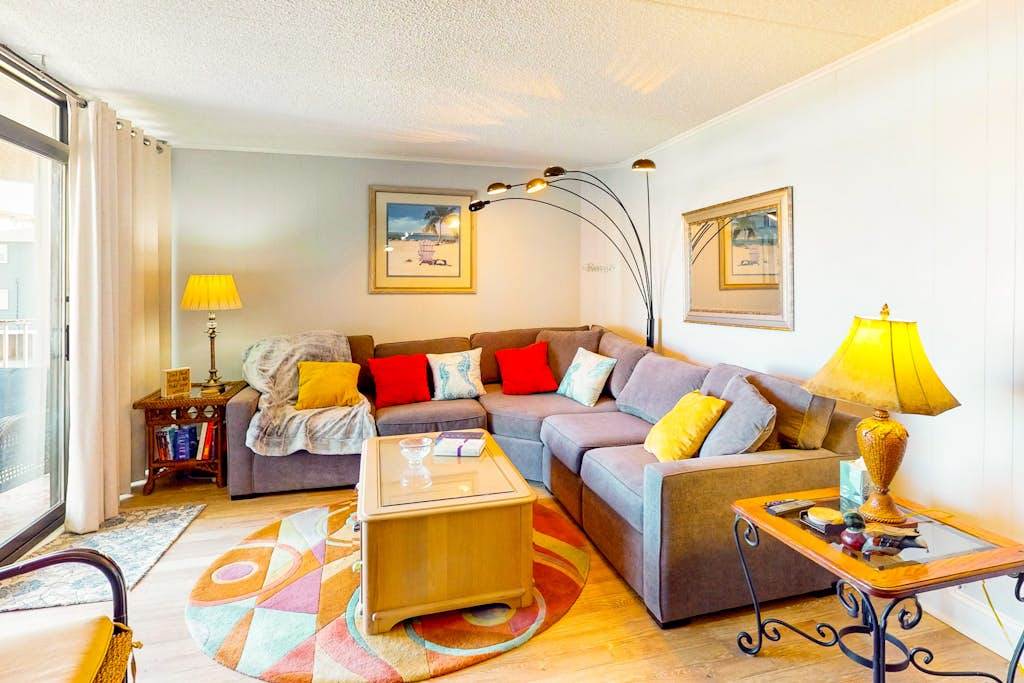 Stunning-spacious condo, near the beach with large balcony, AC, WiFi & shared pool
