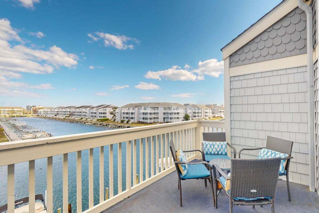 Sunny Waterfront Condo with Canal Views, Balcony, Central AC, Shared Pool & Tennis