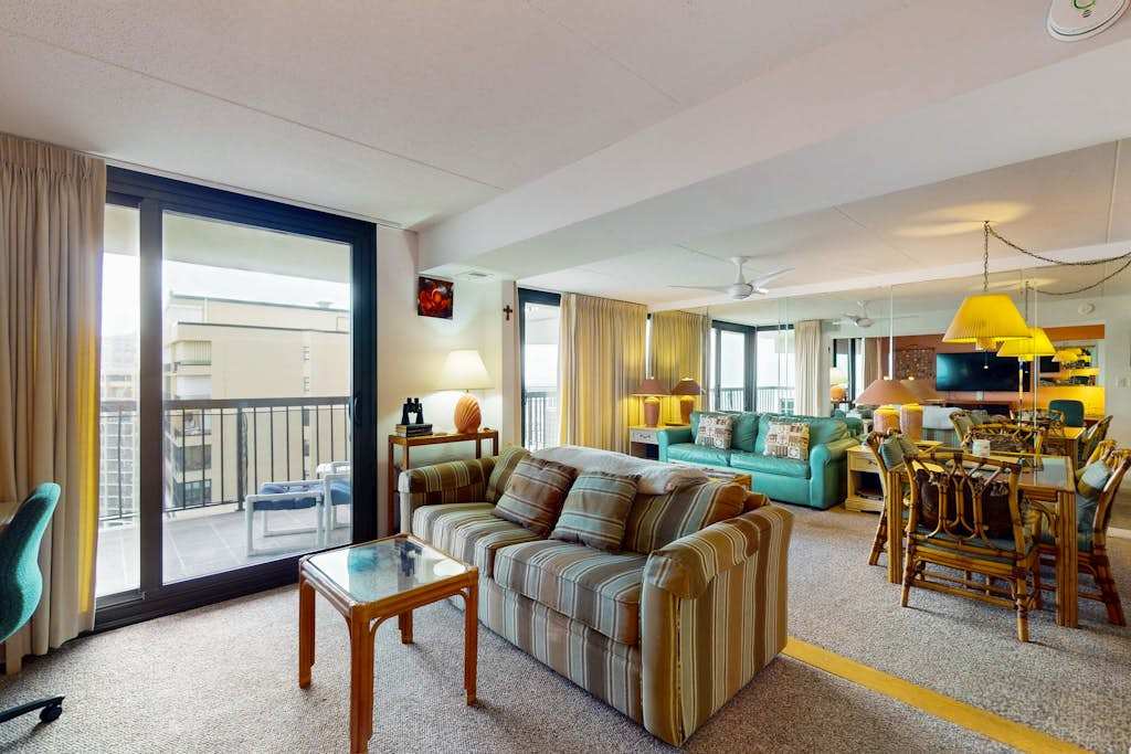 Joyful beachfront condo with balcony, views, pools, gym, game room & tennis