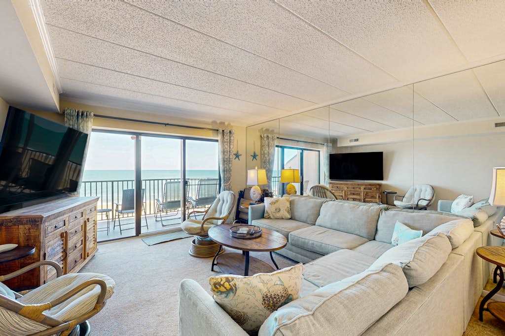 Sunny oceanfront condo with private balcony, ocean views, free WiFi & AC