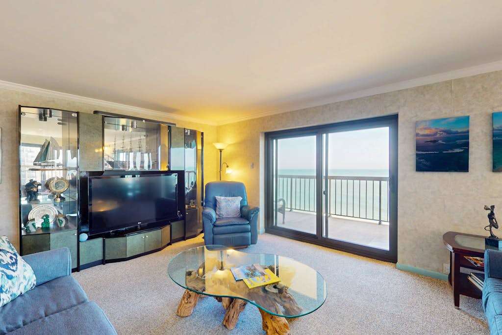 Luxury - penthouse beach condo with balcony, washer & dryer, pools, gym, sauna, tennis & AC