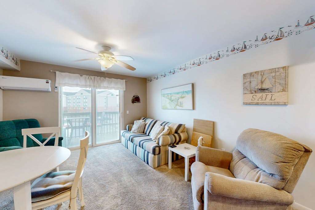 Sun-filled coastal retreat near parks & the beach, with balcony & shared pool