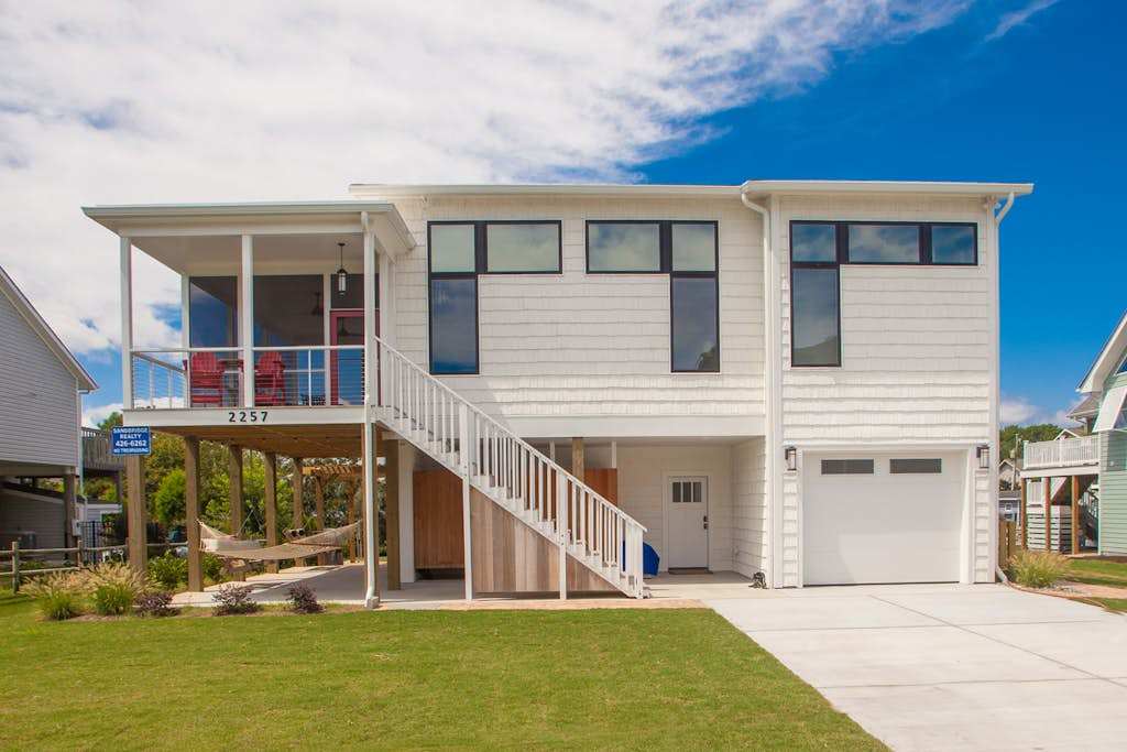 Contemporary home on canal with elevator, dock, private washer & dryer, central AC