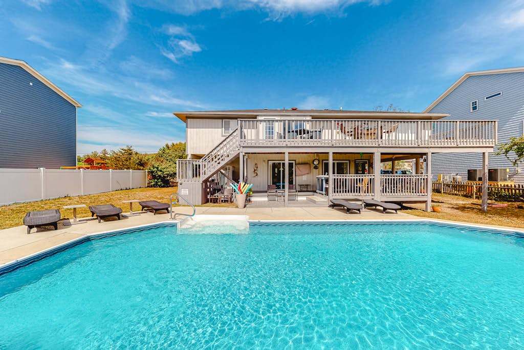 Beach house close to the pier with private outdoor pool, gas grill, dock, decks, AC