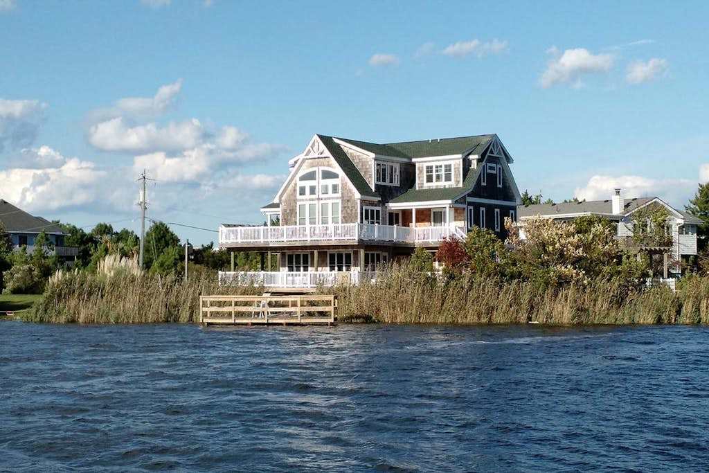 Incredible bayfront home with private dock, pool & 2 fireplaces