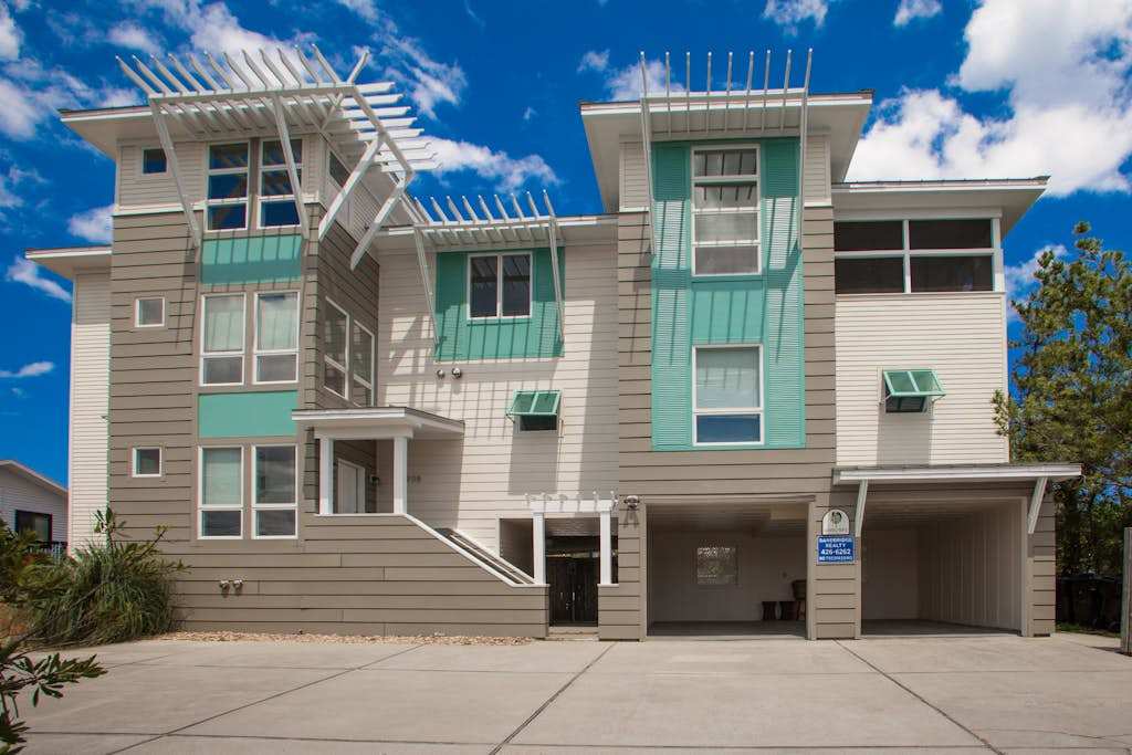Three-story home with private pool, elevator, private washer & dryer, and central AC