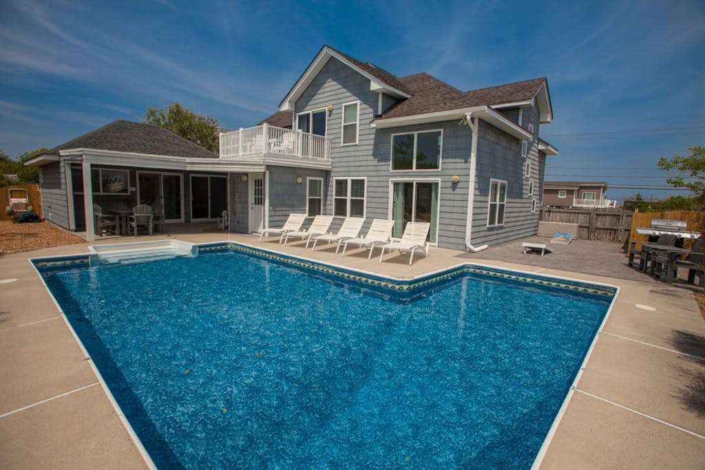 Trendy home steps from beach access with private outdoor pool, gas grill, balcony