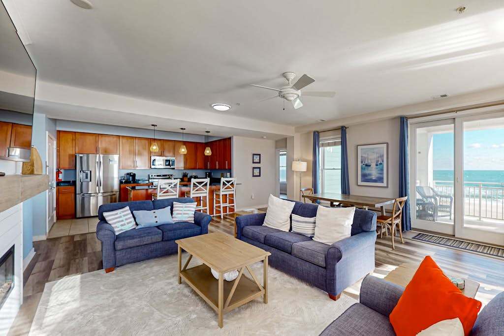 Beachfront 2nd-floor condo with ocean views, balcony, 3 pools & gym