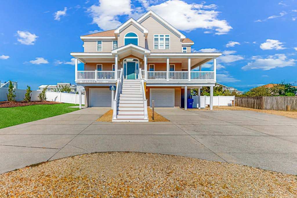 Three-story beach dream with a private pool, decks, & central AC