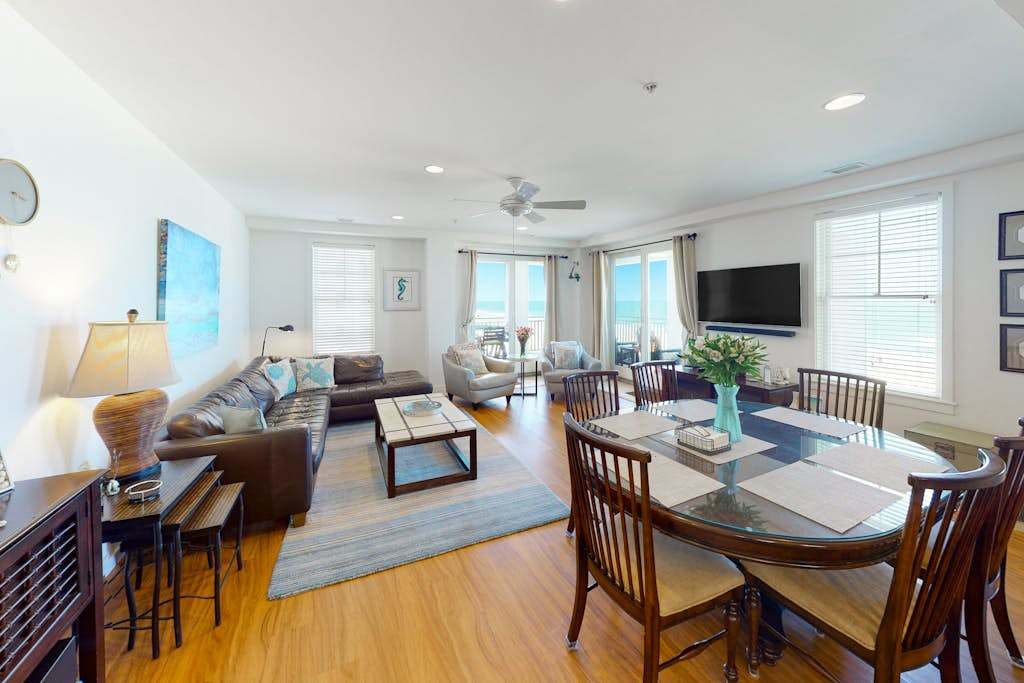 Oceanfront condo with large wraparound deck, expansive views, pools & gym