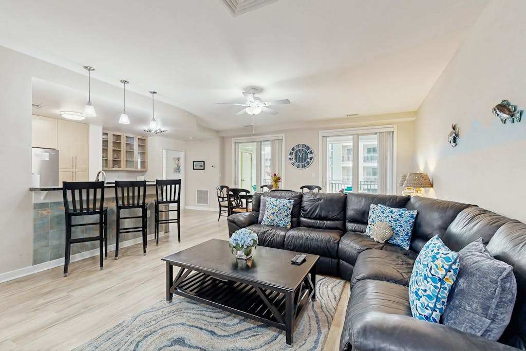 Renovated condo with ocean and back bay views, central AC, & pools