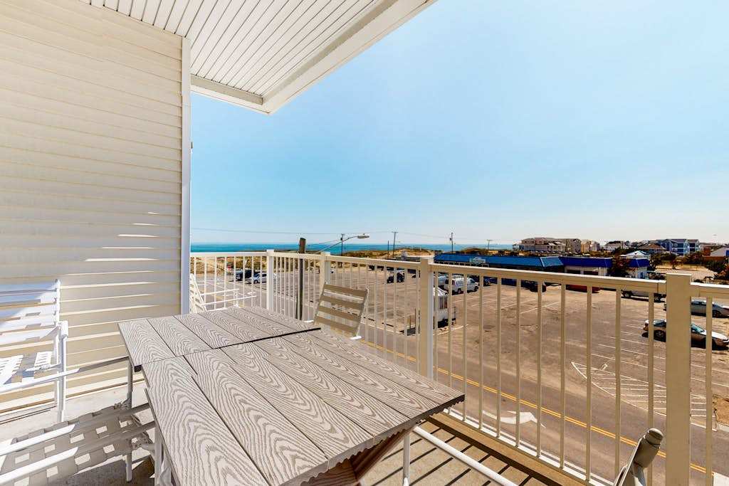 Ocean View Condo Steps from the Beach with Fast WiFi & On-Site Pool & Gym