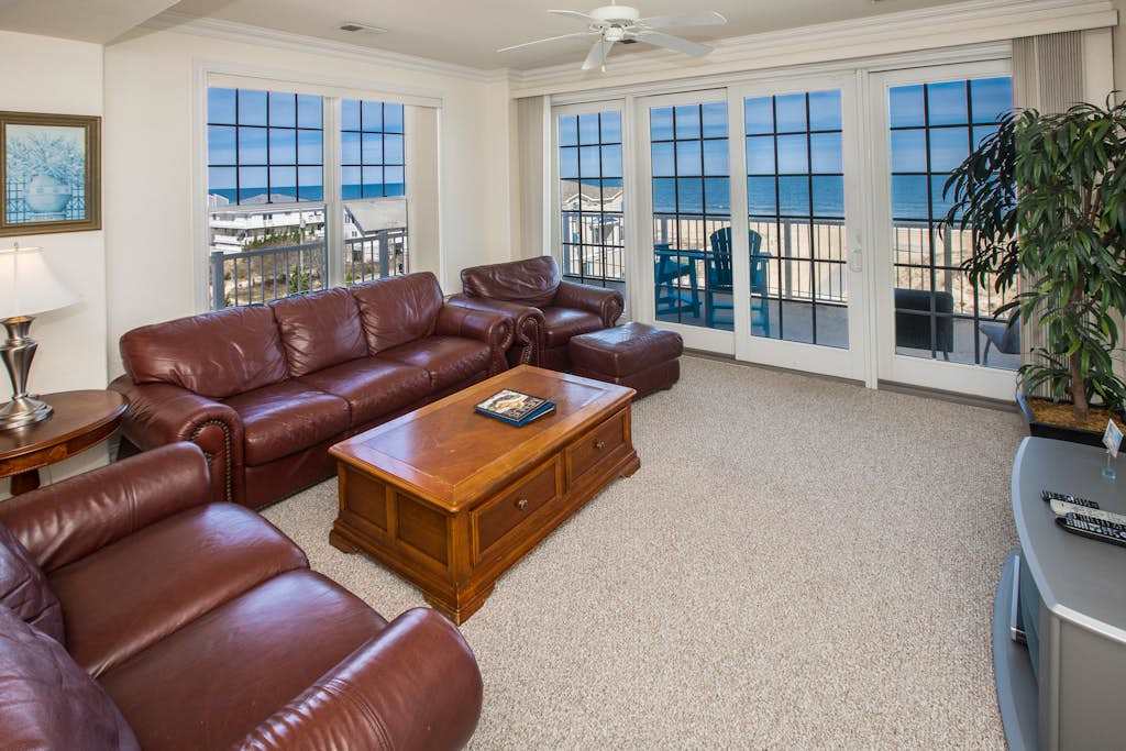 Oceanfront, corner condo with wraparound deck, great views & on-site pool & gym