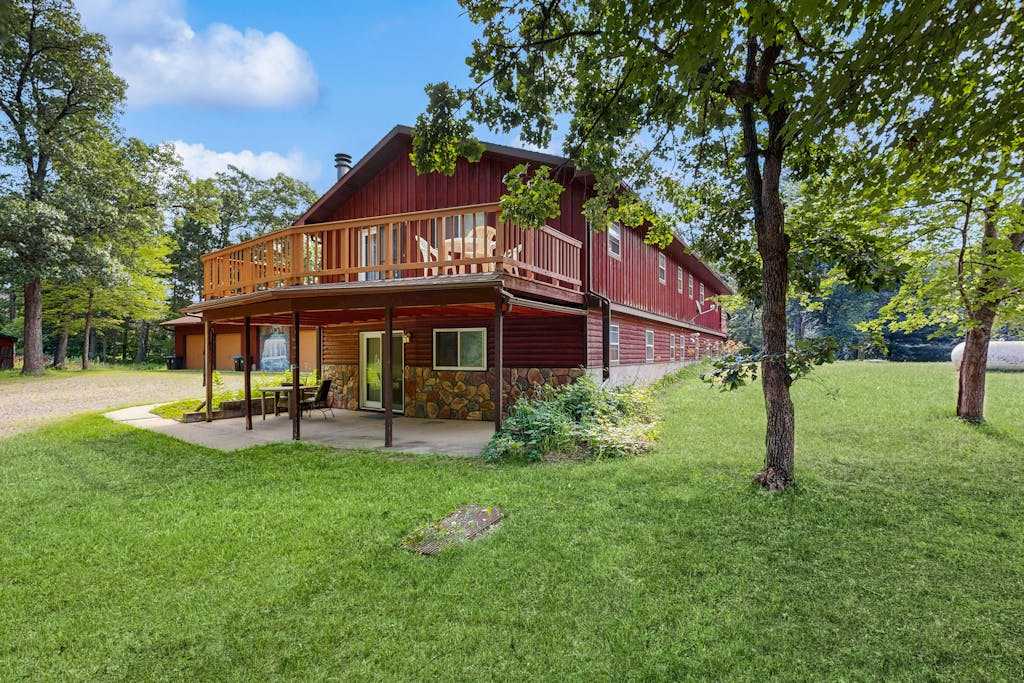 Two-family retreat with 2 kitchens, wooded charm near lakes, trails & adventure