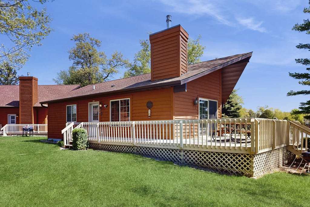 Lakefront retreat with panoramic views, large backyard, & direct beach access