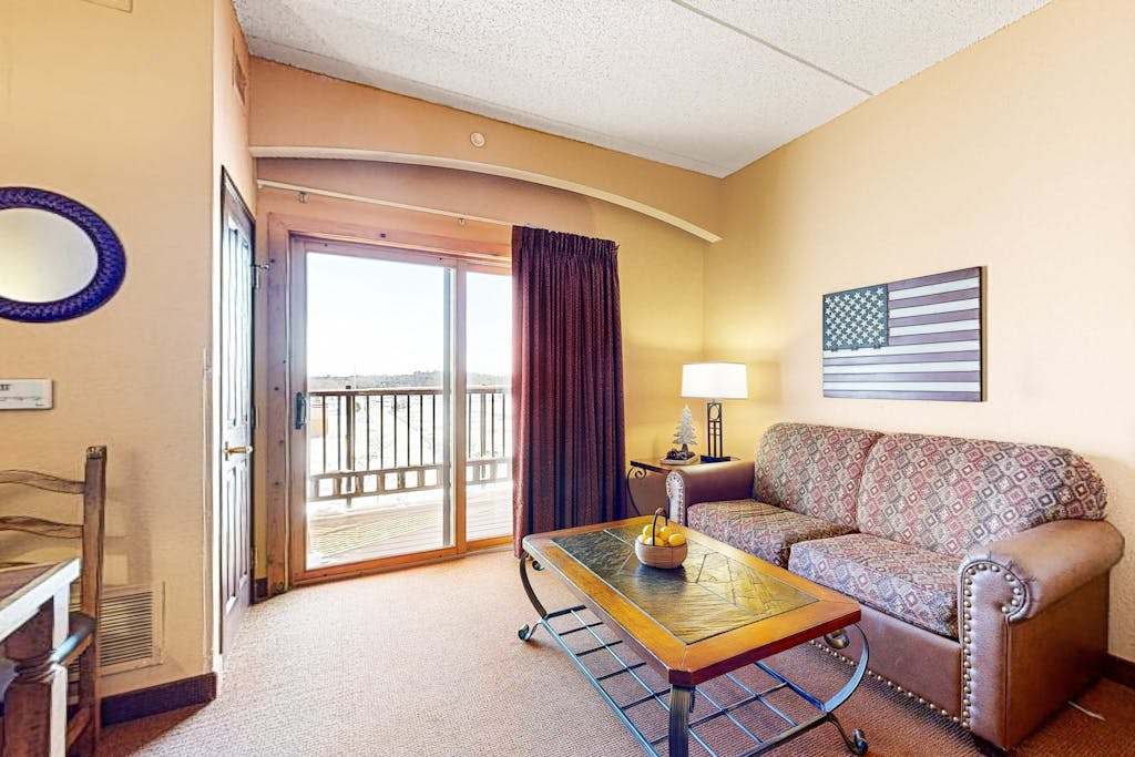 Riverside resort studio with balcony