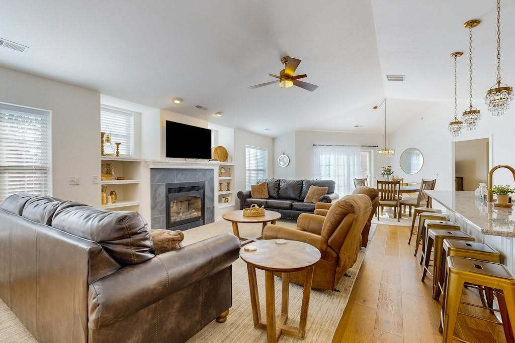 Lakefront resort townhome with resort pools and beaches, private deck, & fireplace