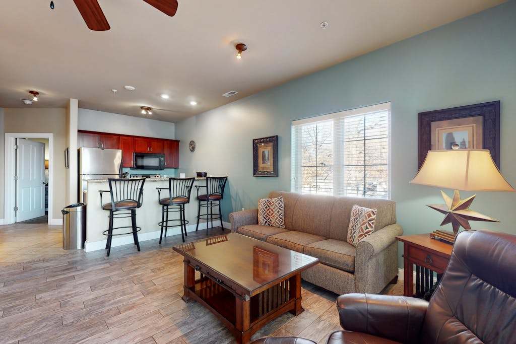 Experience laid-back lakefront living at this Delton Grand condo with pools