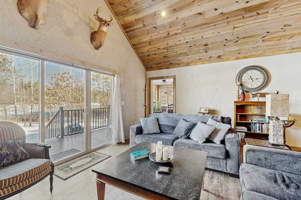 Waterfront home in great location with dock, fire pit, row boat & kayaks