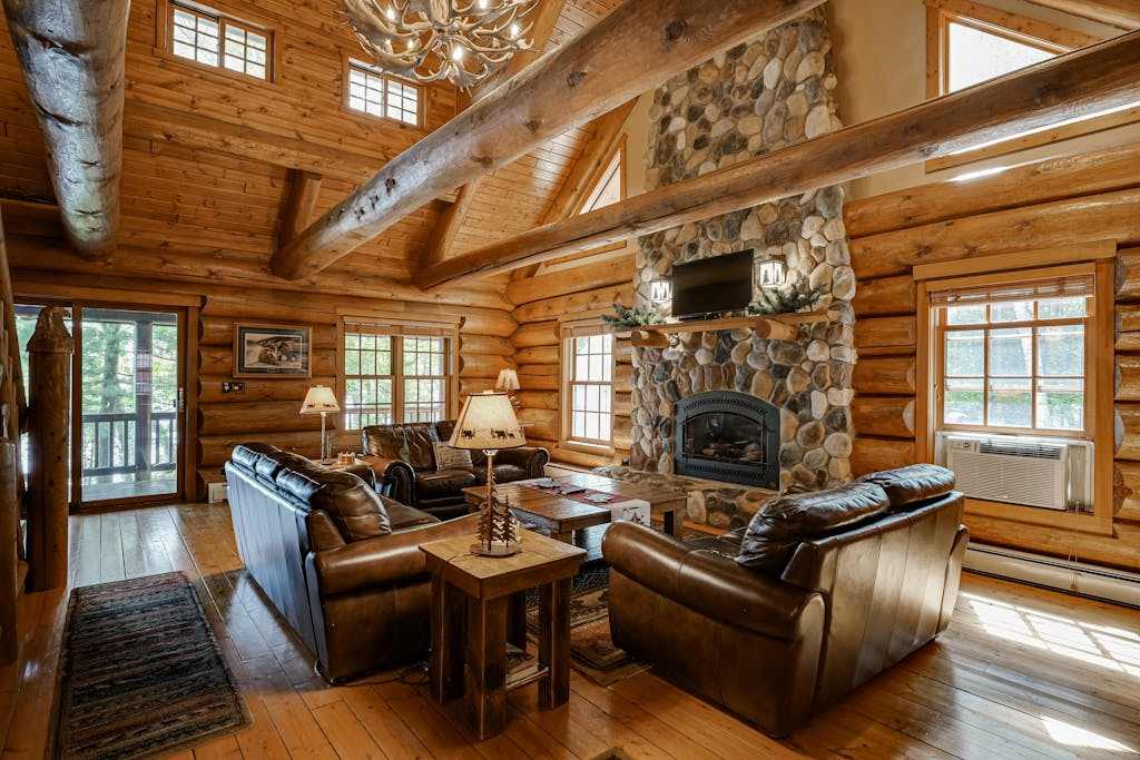 Secluded waterfront log cabin with game room, dock, fire pit & deck