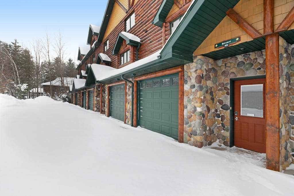 Waterfront townhome with fireplace, private patio, & shared boat docks