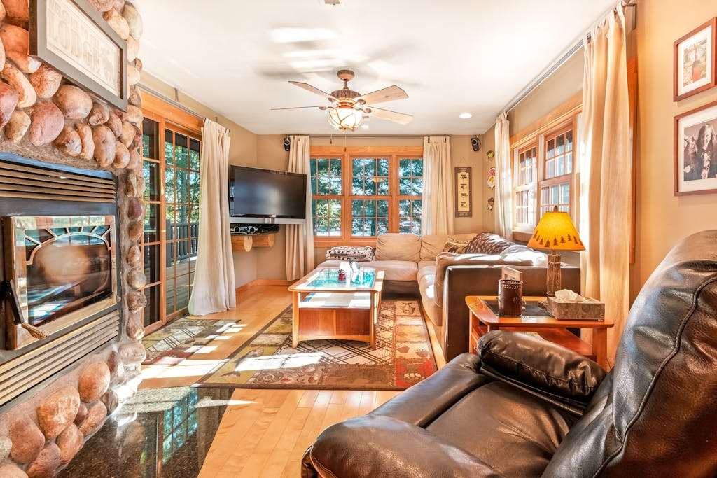 Dog-friendly waterfront cabin with wood-burning fireplace, boat dock, & firepit