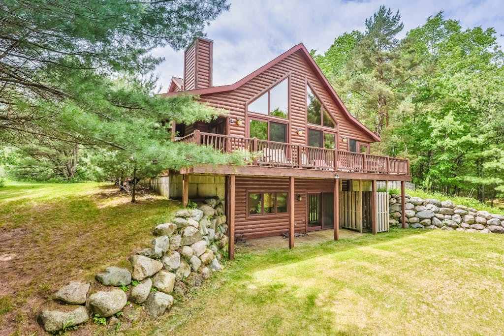 Secluded lakefront cabin with deck, dock, kayak, canoe, & WiFi
