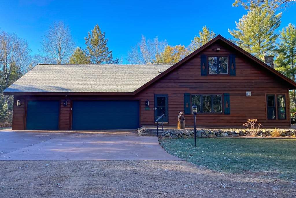Lakefront home with game rooms, dock, kayaks, private beach, fireplace, firepit
