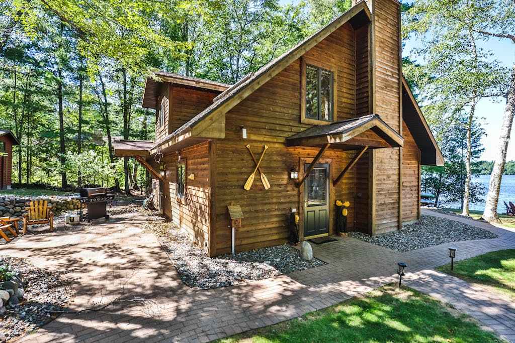 Waterfront getaway with wood fireplace, dock, & lakeside deck