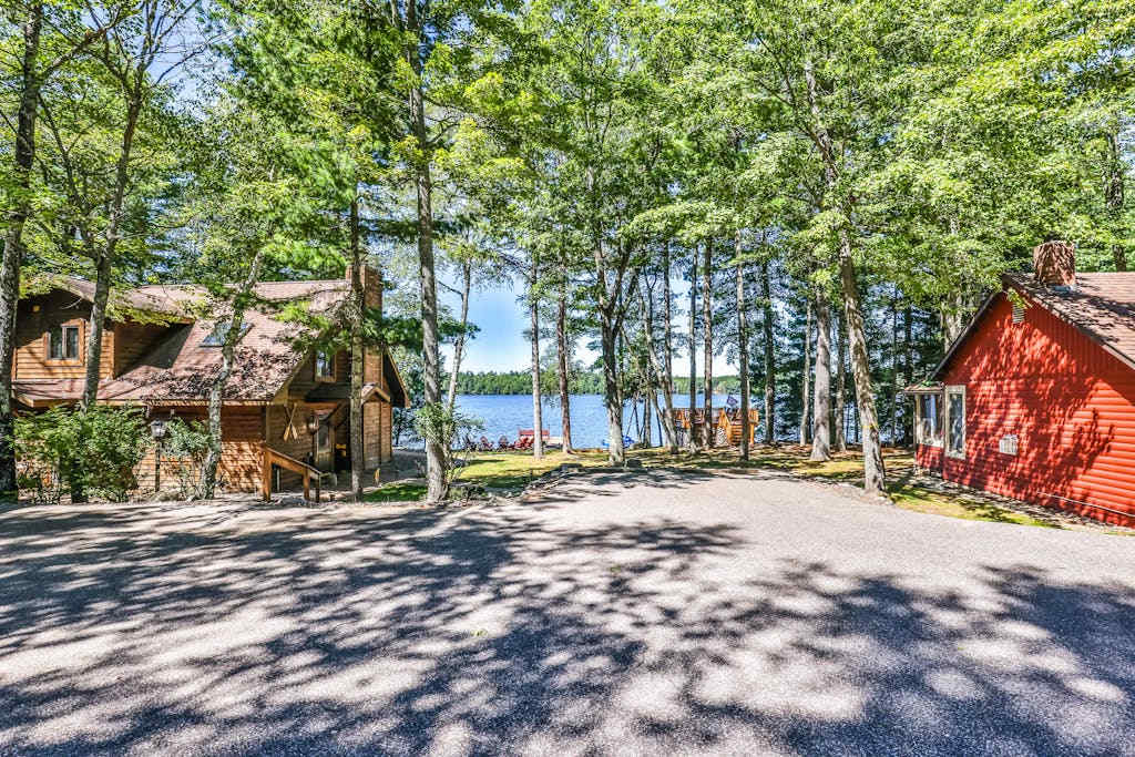 Lakefront retreat with two full kitchens, fireplaces, washer & dryer, & two docks