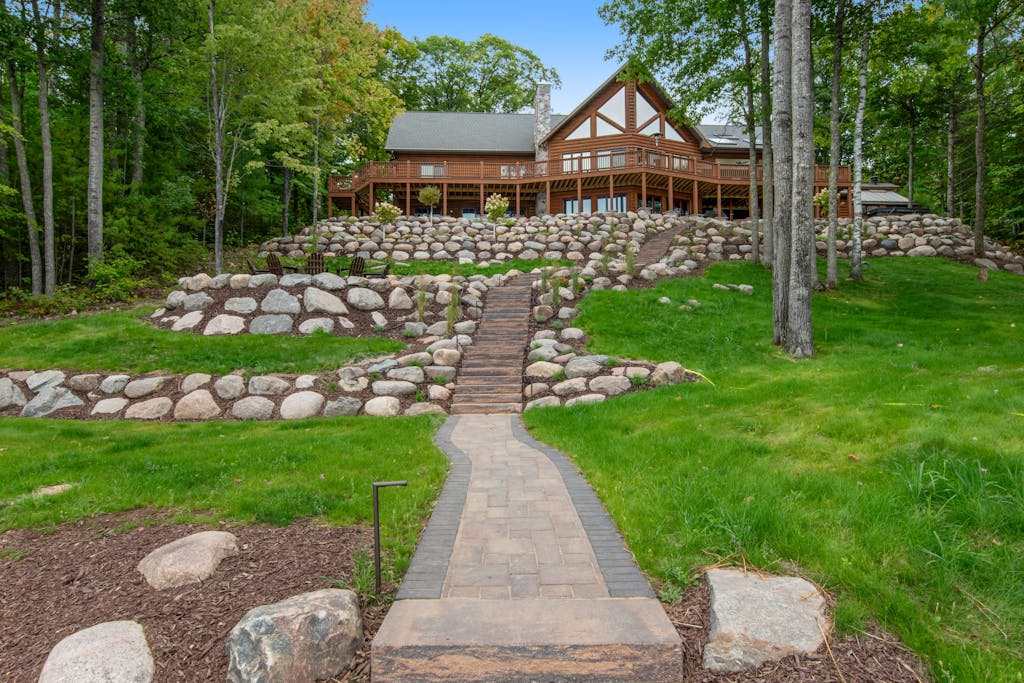 Lakefront estate with 3-story chalet & guest house - hot tub, game room, and gym