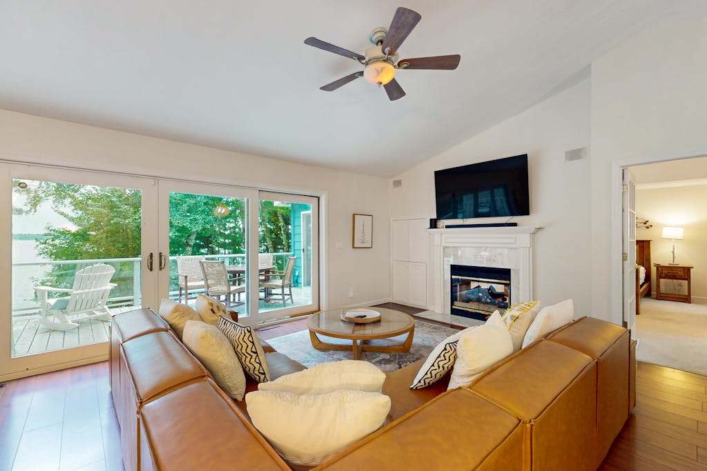 New listing - lakefront home with views, dock, fireplace, foosball, deck, & washer & dryer