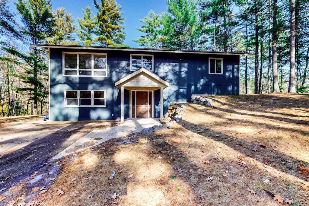 Updated home near downtown Eagle River & beach with fireplace, grill, decks, washer & dryer