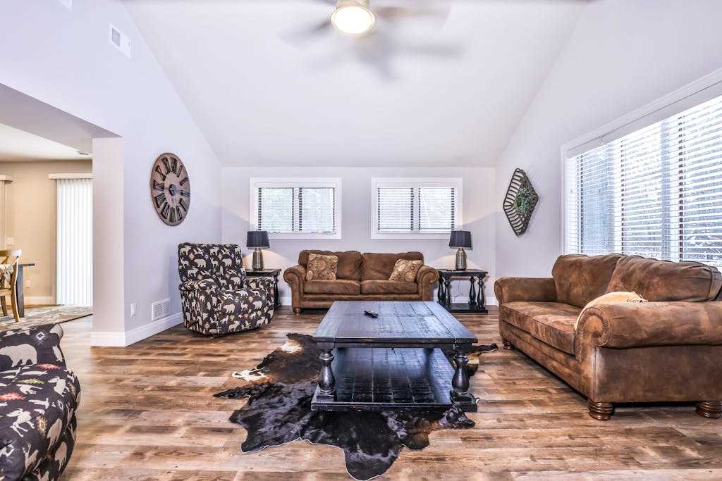 Updated, tree-lined home on the snowmobile trail with gas fireplace & firepit