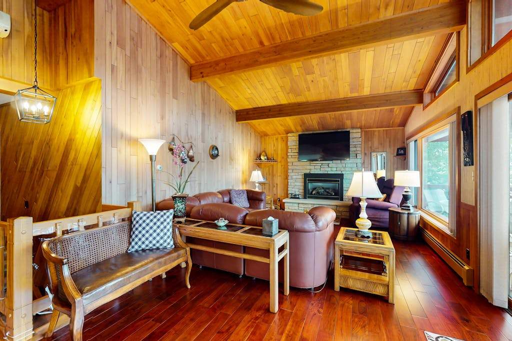 Lakefront home on South Two Lakes with lake views, lake access, firepit, & dock
