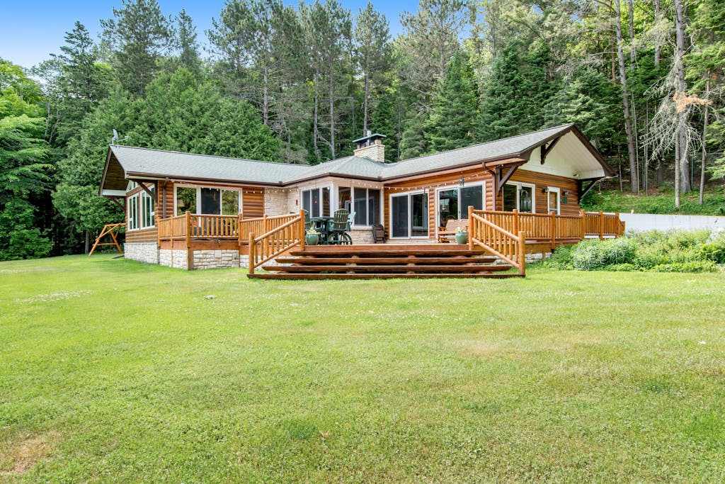 Dog-friendly and secluded lakefront gem with a full bar, private dock, and views