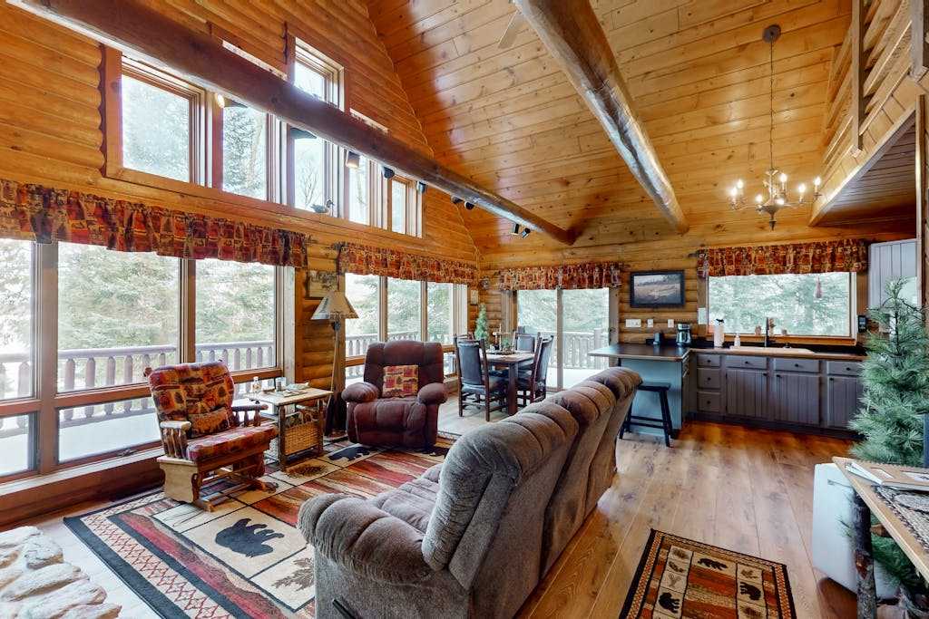 Spacious and beautiful lakefront log home on 7 acres with private dock