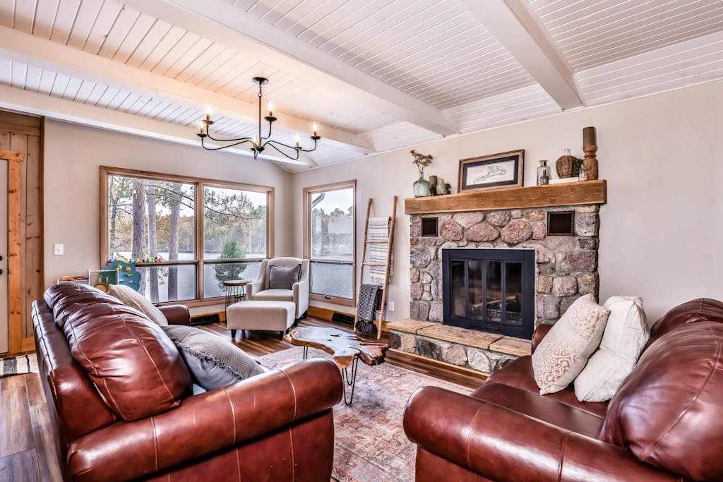 Lakefront home with private dock, deck, fireplace, firepit, canoe & paddleboat