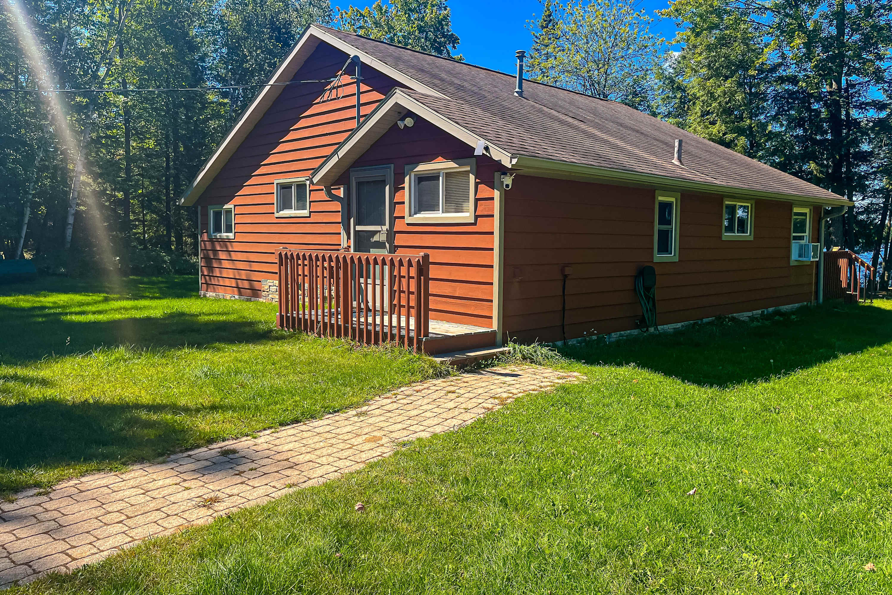Dog-friendly lakefront property with dock, boat lift, firepit & hot tub