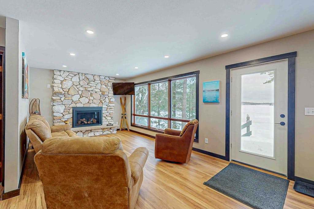 Waterfront home in great location with private dock, firepit & deck