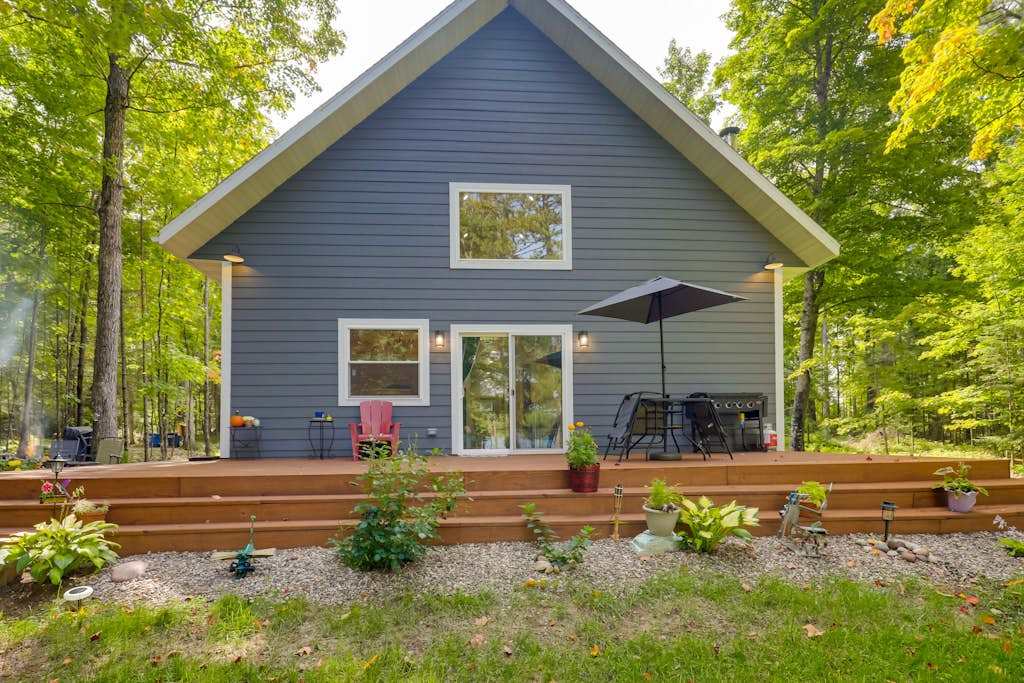 Lakefront home with, dock, kayaks, paddle boards, fire pit & more