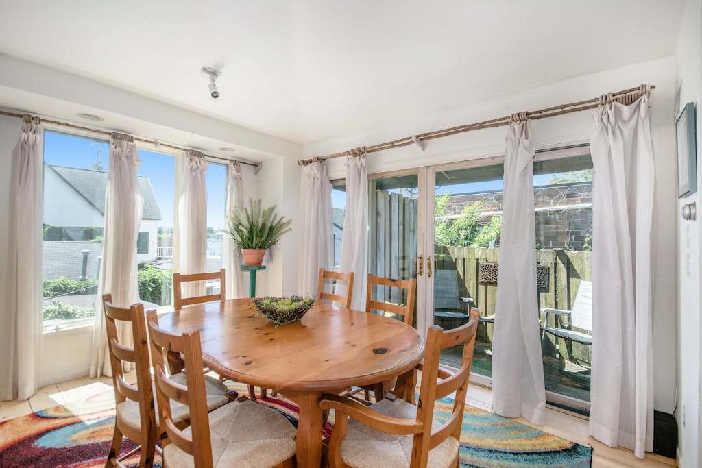 Downtown, dog-friendly condo with a full kitchen, gas fireplace, & balcony