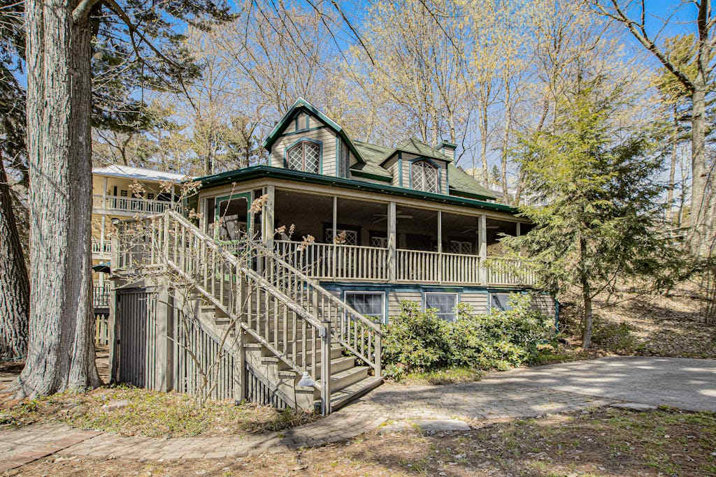 Calming Cottage on the River with Furnished Porch, Lofted Layout & Ideal Location