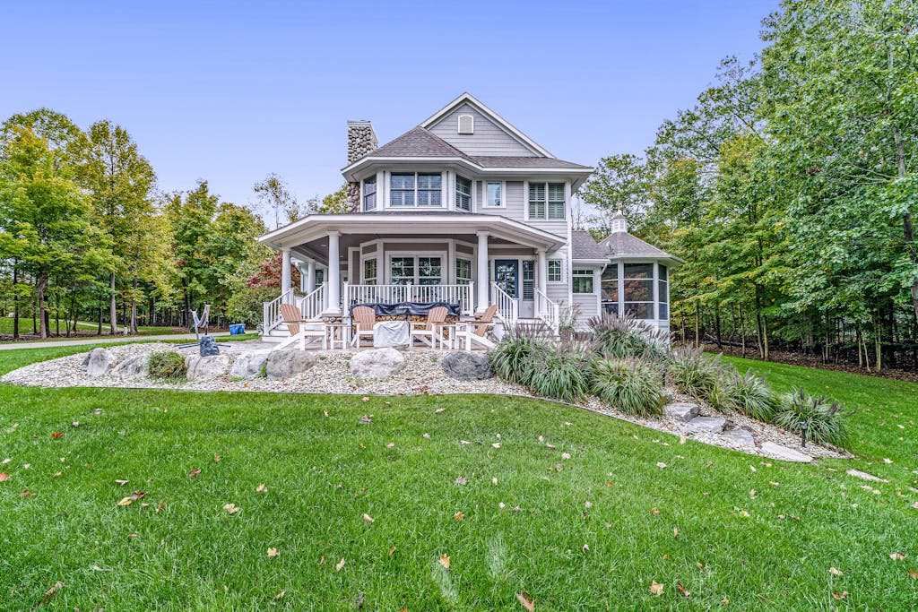 Lakeview home with beach access, private pickleball court, firepits & fireplace